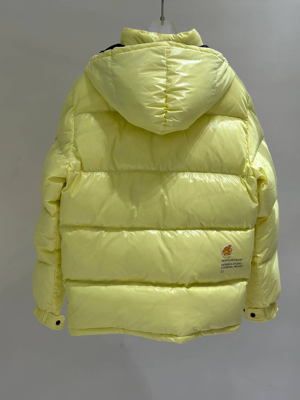 Moncler Yellow Hanging Jacket: Latest Fashion Trends